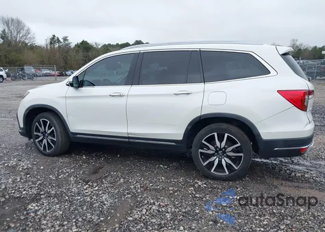 2019 Honda Pilot Touring z USA, uszkodzony, nr VIN 5FNYF5H6XKB037214
